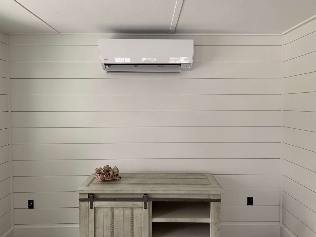heat pump in small white room